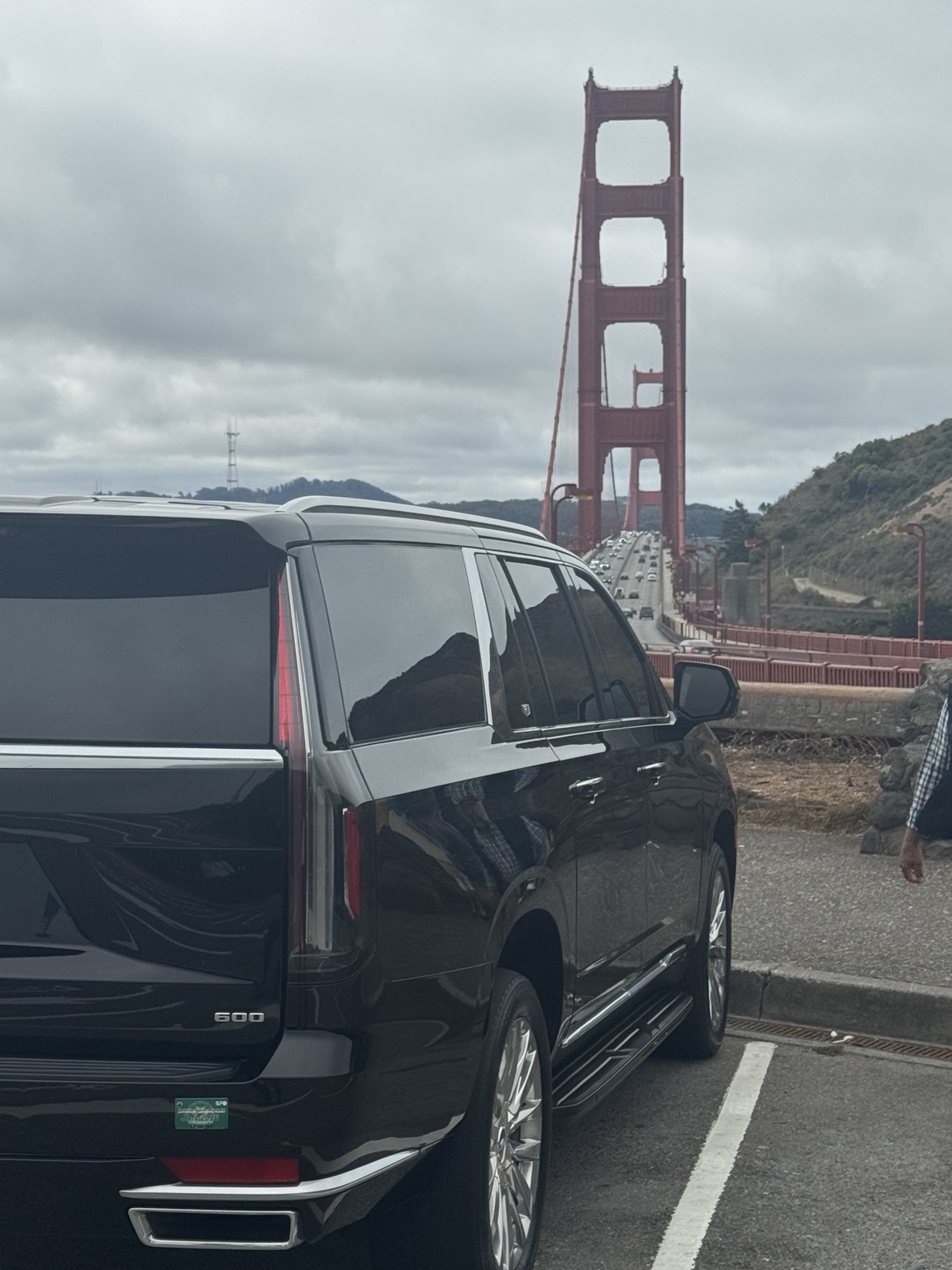 Cadillac Escalade parked near the Golden Gate Bridge