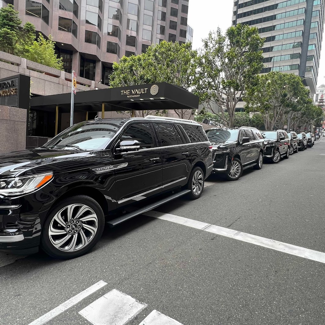 Lineup of luxury SUVs prepared for coordinated transportation in San Francisco